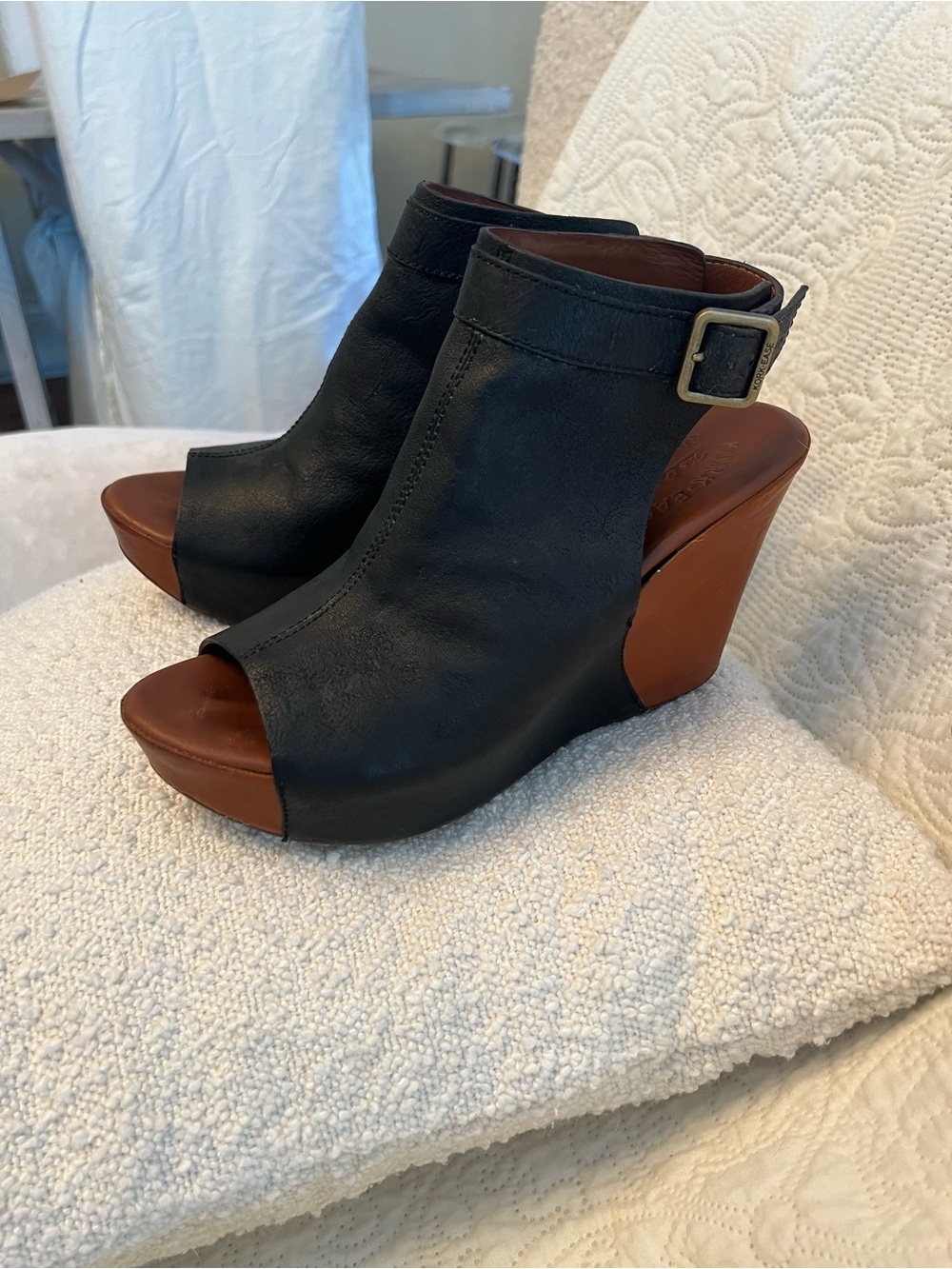 Kork-Ease Berit Wedge in black leather with a brown leather-wrapped wedge heel.
